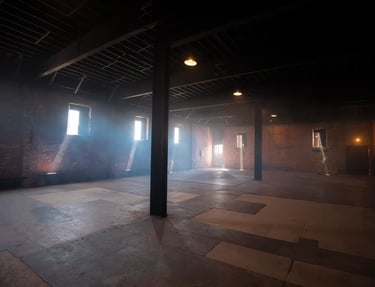 Warehouse loft rental Los Angeles — Grayfox Studios industrial space with exposed brick, steel beams, and natural light