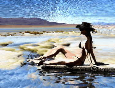a woman in a bikini top sitting on a log