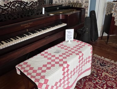 quilt on piano