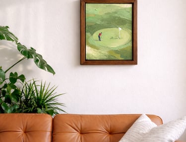 Made to order golf painting displayed in private collectors home above leather couch.