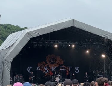 Caskets band performing on stage