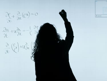 a person standing in front of a white board with a white board