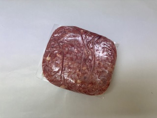 vakuumiertes Produkt, tiefgekühlter Fleischblock; Hänchen, ganz