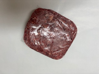 vakuumiertes Produkt, tiefgekühlter Fleischblock; Ente, ganz