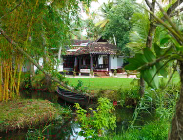 Vembanad House a bungalow that is completely encircled on three sides by the enormous Vembanad Lake.