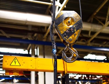 crane hook requiring service, also pendant cable that requires replacement and repairs