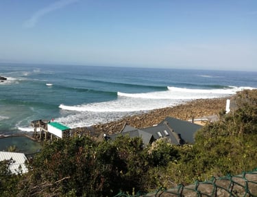 a view of a beach with a view of the ocean