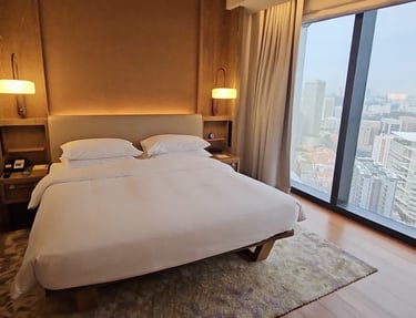Andaz Singapore King City View room interior with king bed