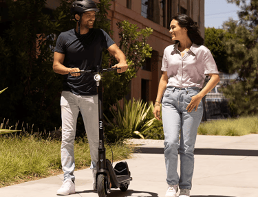 a man and woman standing next to each other