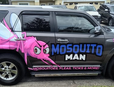Mosquito Man mosquito control service vehicle serving local neighborhoods