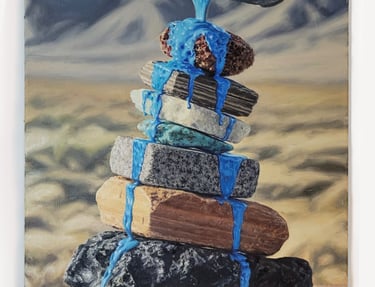 Oil painting of vibrant blue paint pouring over a balanced stack of desert stones and flat rocks.