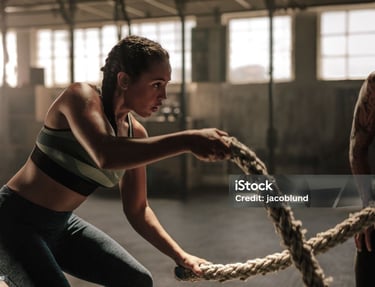 a man and woman doing a rope 