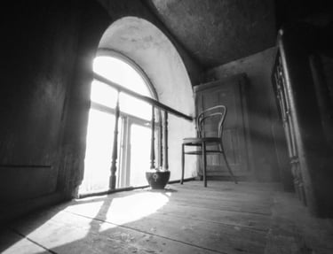 Sunlight-filled space with chair and window