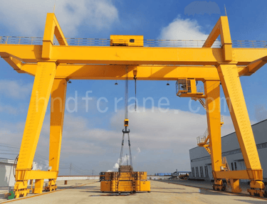 Picture of large gantry crane lifting equipment. 