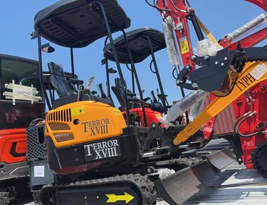 TERROR XVIII mini excavators being trucked across USA