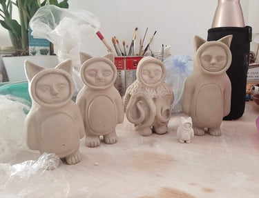 making ceramic figurines cat art and octopus art