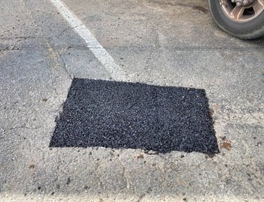Pothole repair in parking lot