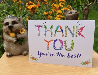 A greeting card with the words Thank You you're the best printed in tropical exotic word art