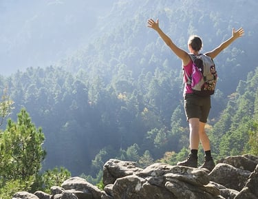 a man celebrating his therapy goal Overcoming challenges