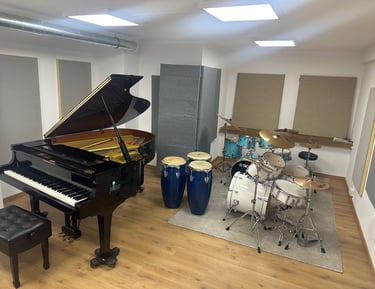 a piano and drums in a room with latin percussion 