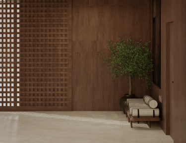 Warm interior with a wooden lattice screen and a daybed with a plant.