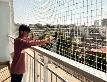 A playground area enclosed safely by durable safety nets.