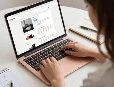 A happy client reviewing their new website on a tablet in a cozy room.