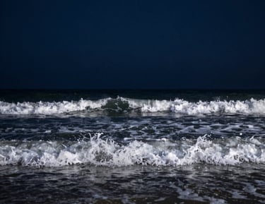 A tranquil lake at twilight with navy skies and gentle gray reflections symbolizing steady guidance.