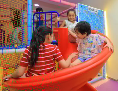 Kids sliding in paly zone