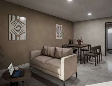 a living room with a couch and a laptop