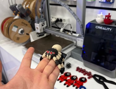 a person holding a toy in their hand