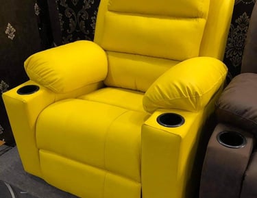 A yellow recliner by afsar sofa repair