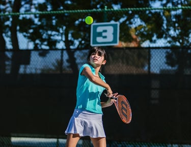 a girl playing tennis