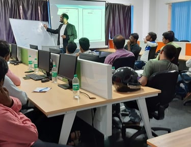 a man standing in front of a class room