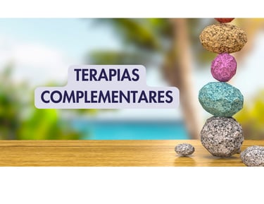 Imagem de uma mesa com pedras coloridas empilhadas escrito terapias complementares