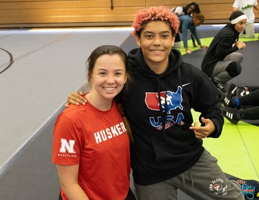 Female wrestlers smiling