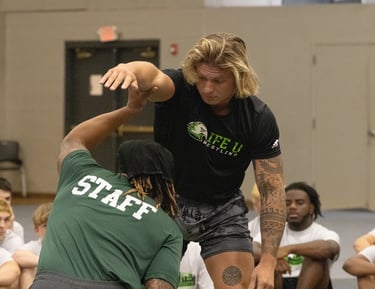 Coach Demonstrating Technique