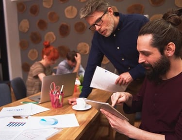 Saudi Food Registration Team brainstorming solutions at a conference table