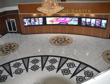 a large screen tv set up in a lobby