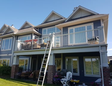 exterior house painting with ladder 