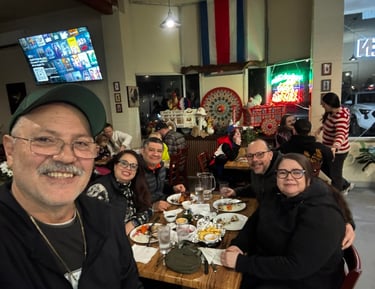 Las Brasas Costa Rican restaurant filled with happy customers and owner Jorge Zuniga