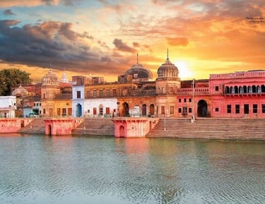 a beautiful sunset over a river with a boat in the foreground