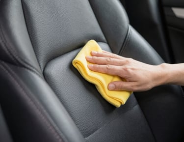 Technician using specialized equipment to deep clean car carpets.
