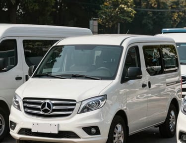 Comfortable interior of a private vehicle with leather seats and air conditioning.