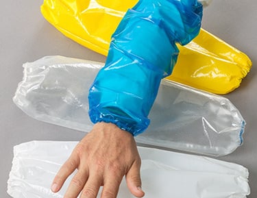 gowns, nitrile gloves and safety wear