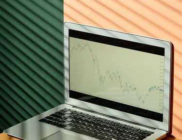 Macbook Air on Brown Wooden Table with Screen Display
