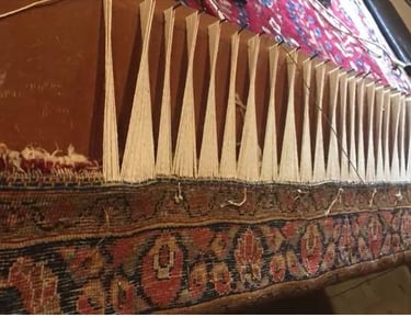 Professional rug restoration with handwoven edge and foundation repair.