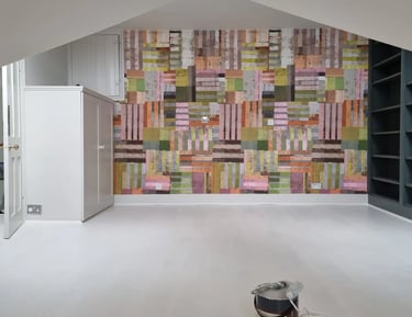 wallpaper installation with colourful patchwork design – completed by Pure Perfection in Balham