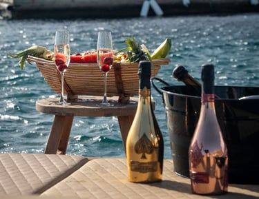 a table with a bottle of wine and a bottle of wine