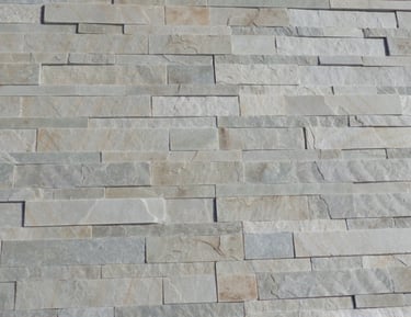 Stone wall with rectangular shaped natural stone, grey shades